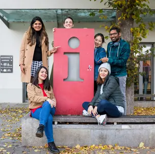 International students at an info point