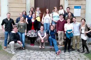 Photos in participants of Bamberg Buddies sitting in a pub getting to know each other.